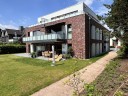 RESERVIERT - Ansprechender Neubau mit 8 Wohneinheiten - barrierearm - Terrasse und groer Gartenanteil