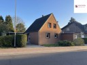 Einfamilienhaus in Grevenbroich mit groem Garten, Stellpltzen und angebautem Ladenlokoal.